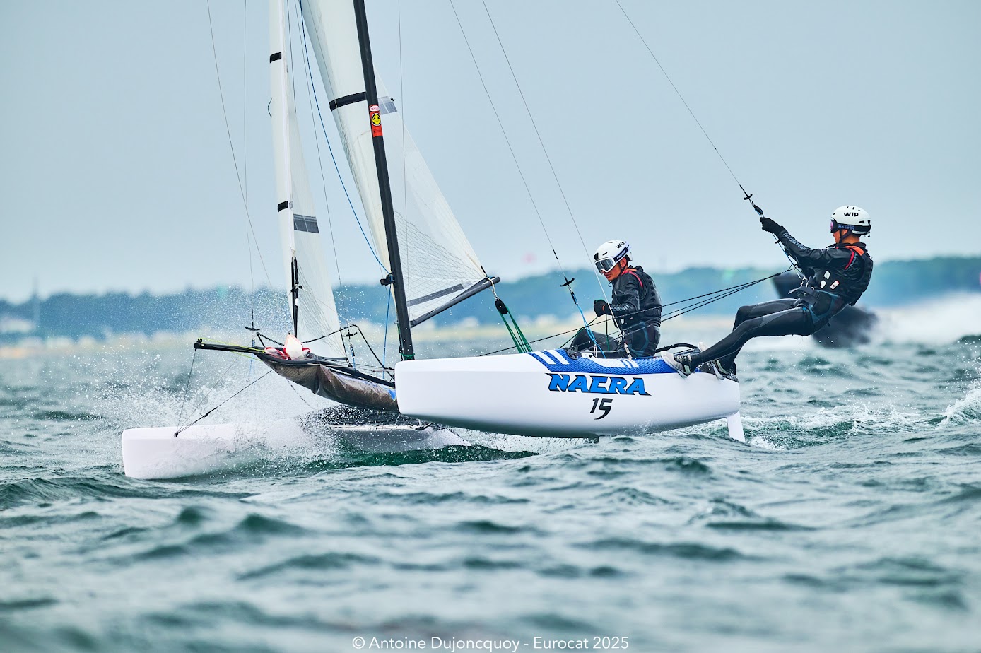 Kids Charging the Nacra 15 in the breeze at the Eurocat 2025. Photo by Antoine Dujoncquoy / Eurocat 2025 / YC Carnac